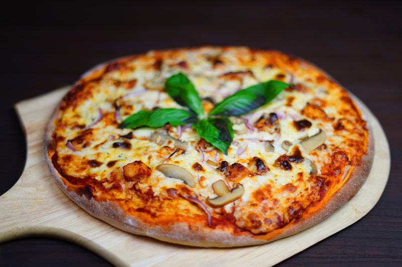BBQ Chicken dions pizza with smoky sauce and grilled chicken